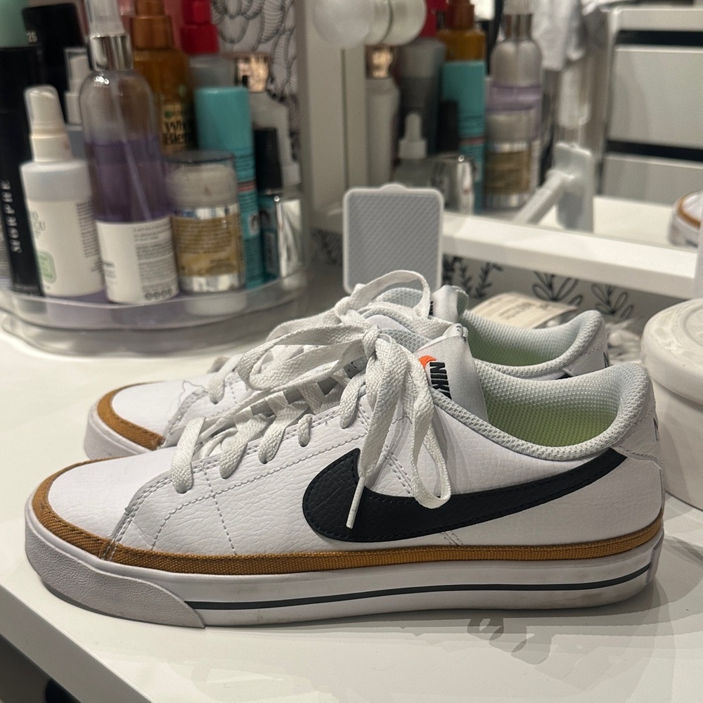 2x$70- Nike White Sneakers with Black Swoosh and Brown Trim